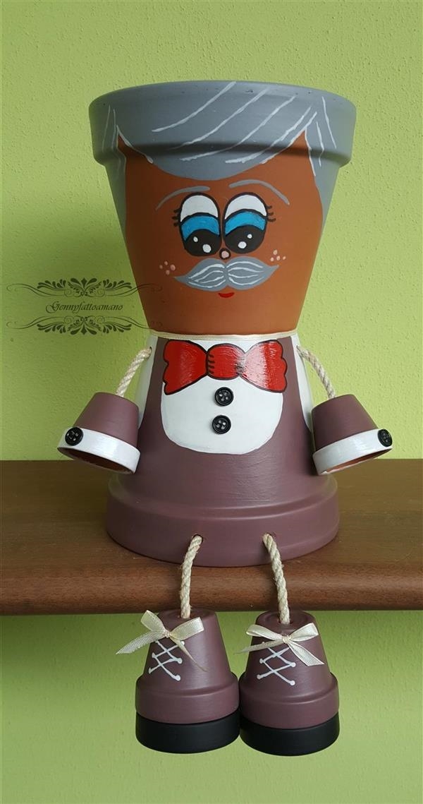 Bambolina in terracotta Zio Beppino Bambolina in terracotta Zio Beppino