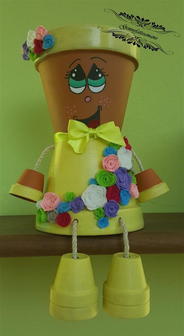 Bambolina in terracotta Primavera Bambolina in terracotta Primavera